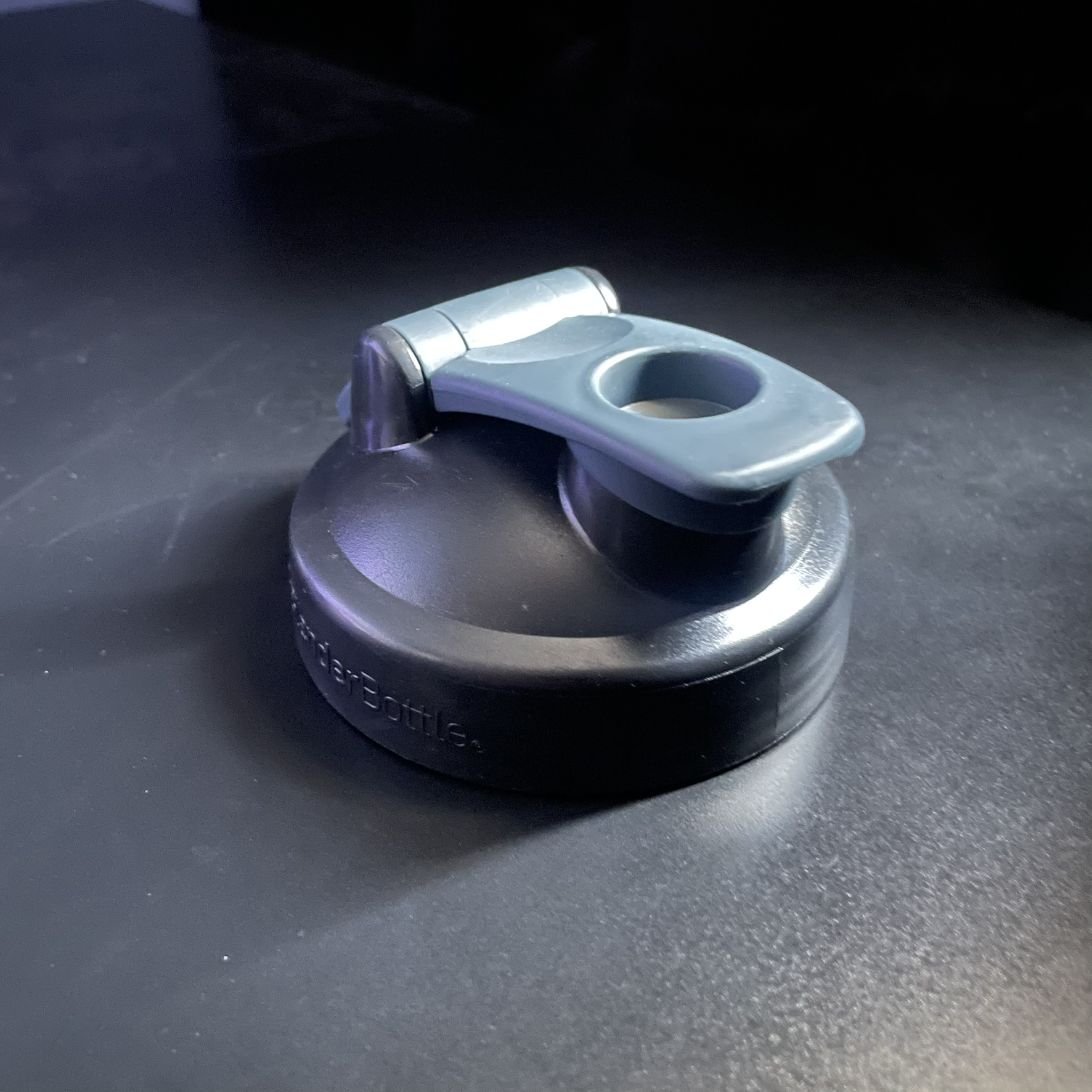 This is the lid of the shaker bottle, the light of the object interaction circuit would likely be on this part