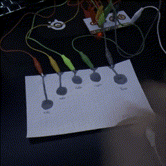 This is the first circuit that I created, I took a piece of paper and used graphite for the connection points and the ground, where my palm would sit on the ground and my fingers would complete the circuit by touching the connection points where the graphite is. A pretty simple circuit just to test out the graphite.